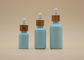 Butelki z olejkiem eterycznym w kolorze niebieskim, o pojemności 15 ml i pojemności 30 ml, z Bamboo Dropper